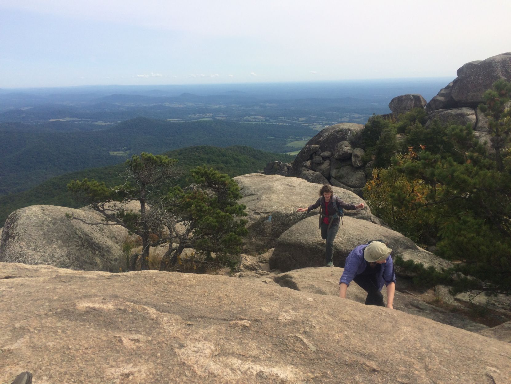 hikers scramble up the Ridge Trail on Old Rag